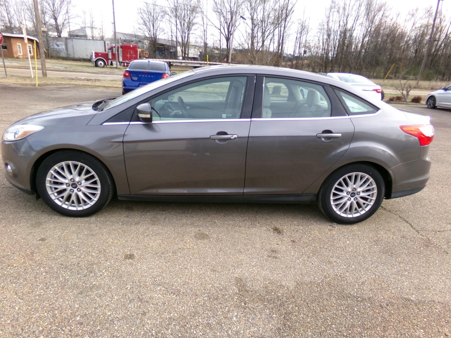 2012 Sterling Gray Metallic /tan Ford Focus SEL (1FAHP3H26CL) with an 2.0L engine, automatic transmission, located at 401 First NE, Bearden, AR, 71720, (870) 687-3414, 33.726528, -92.611519 - Photo#1